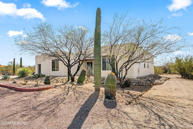 view of front of property featuring stucco siding