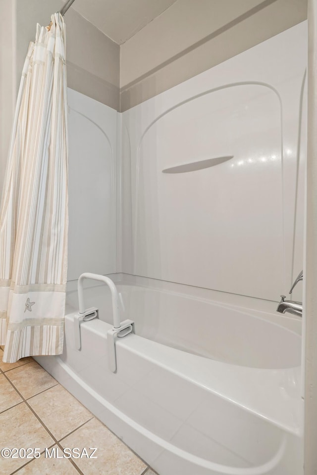 full bathroom featuring shower / bath combination with curtain and tile patterned floors