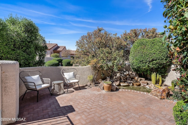 view of patio / terrace with fence