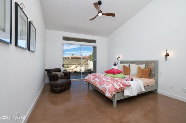 bedroom with high vaulted ceiling, access to outside, concrete floors, and baseboards