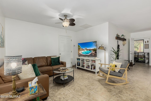 living room with visible vents and ceiling fan