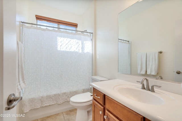 full bathroom with tile patterned flooring, vanity, toilet, and shower / bath combo with shower curtain