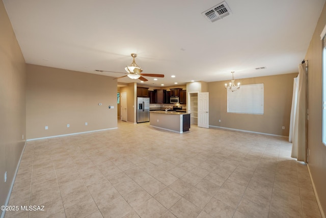 10365 S High Bluff Dr, Vail, AZ 85641 - unfurnished living room with a chandelier, baseboards, ceiling fan, recessed lighting, and light tile patterned floors