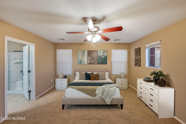 10365 S High Bluff Dr, Vail, AZ 85641 - bedroom with light carpet, baseboards, and connected bathroom