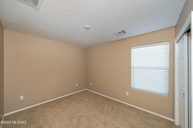 10365 S High Bluff Dr, Vail, AZ 85641 - carpeted empty room featuring baseboards and plenty of natural light