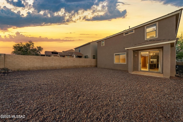 10365 S High Bluff Dr, Vail, AZ 85641 - rear view of house featuring stucco siding, a fenced backyard, and cooling unit