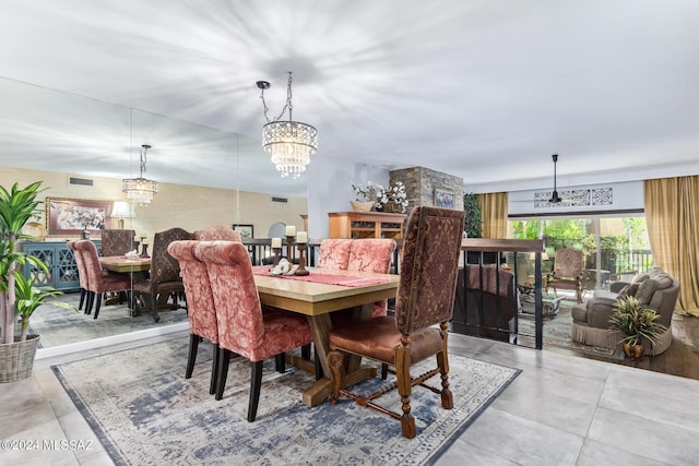 dining room with visible vents and a notable chandelier