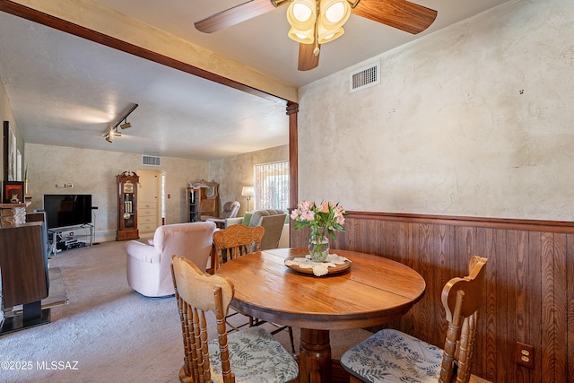 3021 E 2nd St, Tucson, AZ 85716 - carpeted dining room featuring a ceiling fan and a textured wall