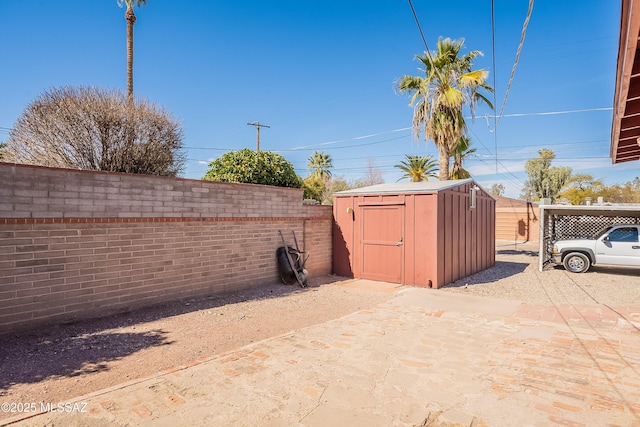 3021 E 2nd St, Tucson, AZ 85716 - view of shed with a fenced backyard