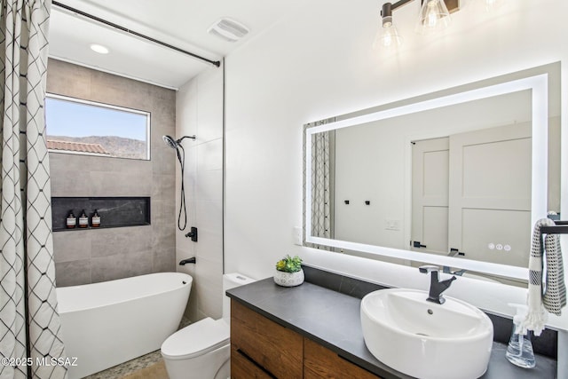 bathroom with a tub to relax in, toilet, vanity, visible vents, and a shower