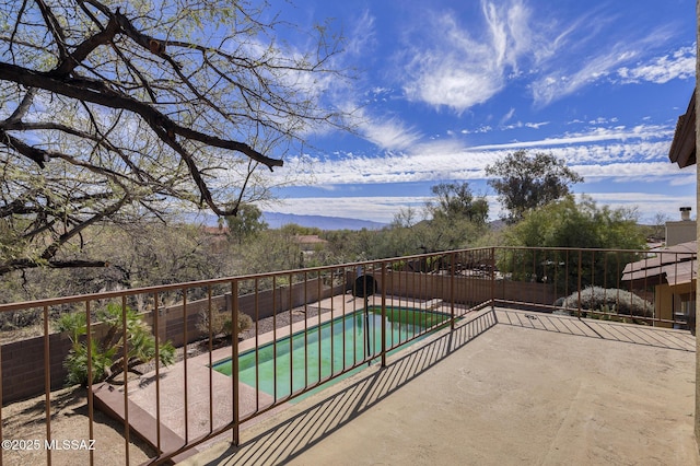 view of pool featuring a fenced in pool, a patio area, and a fenced backyard