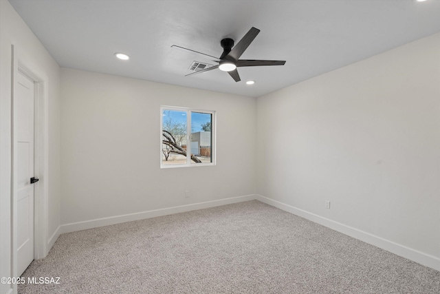 spare room featuring ceiling fan, recessed lighting, visible vents, baseboards, and carpet
