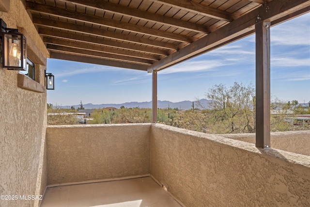 balcony featuring a mountain view