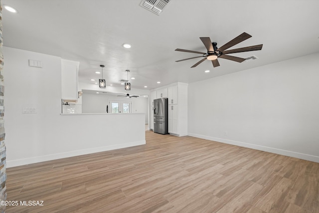 unfurnished living room featuring light wood-style flooring, recessed lighting, visible vents, and a ceiling fan