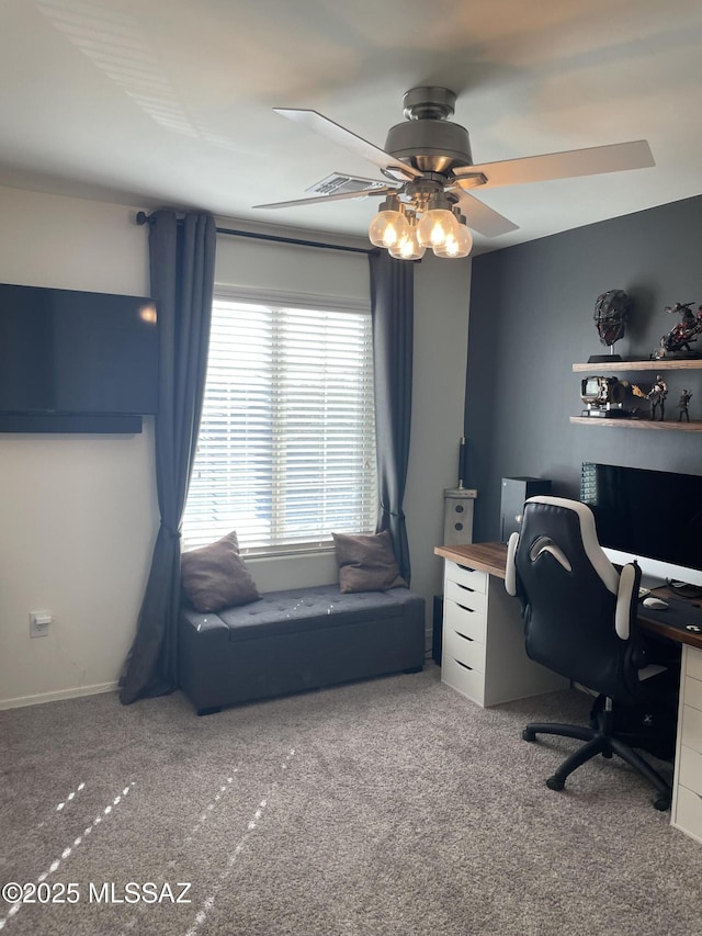 office space featuring carpet floors and ceiling fan