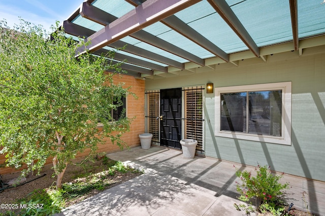 view of patio featuring a pergola