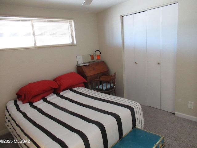 bedroom with a closet and carpet flooring