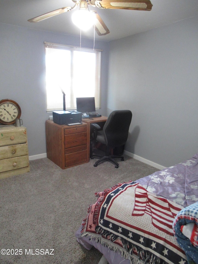 carpeted bedroom featuring a ceiling fan and baseboards