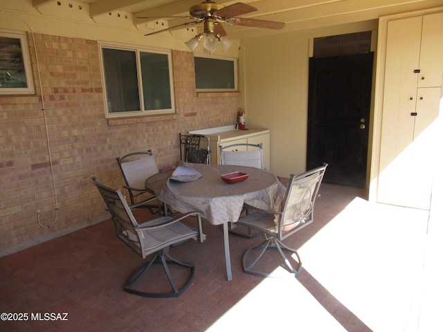 view of patio / terrace featuring ceiling fan and outdoor dining space