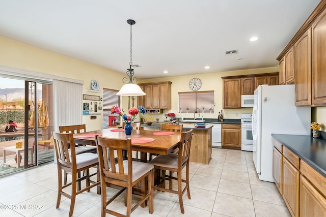 dining space with visible vents, light tile patterned flooring, and recessed lighting