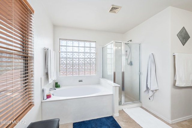 13076 N Desert Olive Dr, Oro Valley, AZ 85755 - full bathroom with a stall shower, a garden tub, visible vents, and tile patterned floors