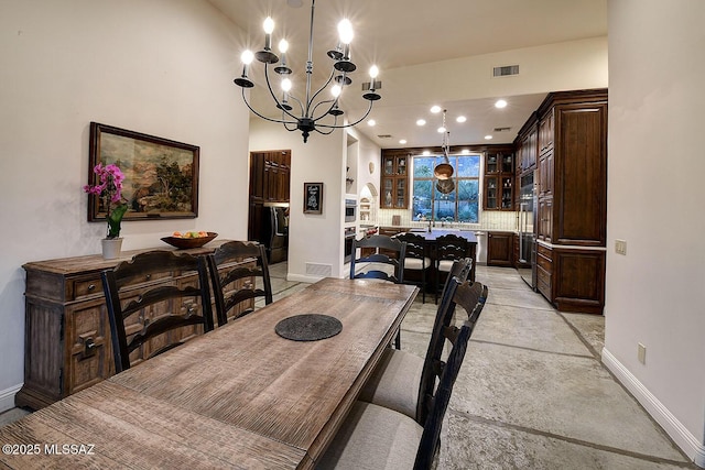 dining room featuring recessed lighting, visible vents, and baseboards