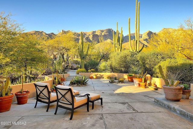 view of patio featuring a mountain view