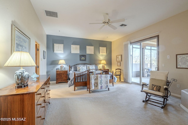 bedroom with light carpet, baseboards, visible vents, and access to exterior