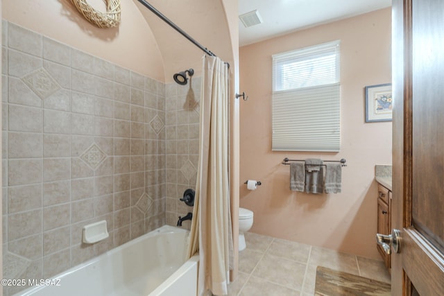 bathroom with visible vents, toilet, shower / tub combo with curtain, tile patterned flooring, and vanity