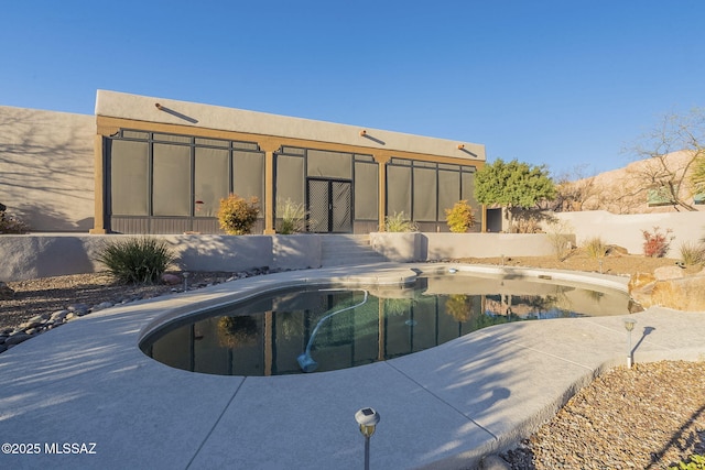 view of pool featuring a fenced in pool