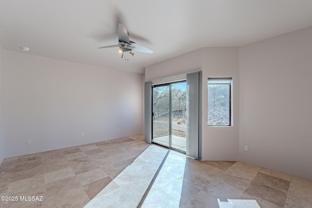 spare room featuring a ceiling fan