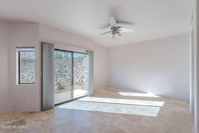 spare room featuring ceiling fan