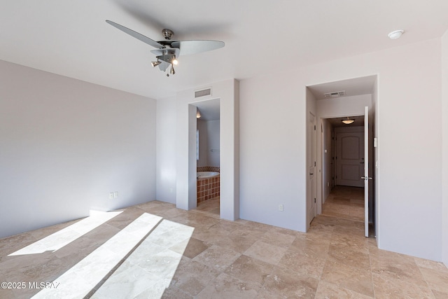 unfurnished bedroom with visible vents, ceiling fan, and ensuite bathroom