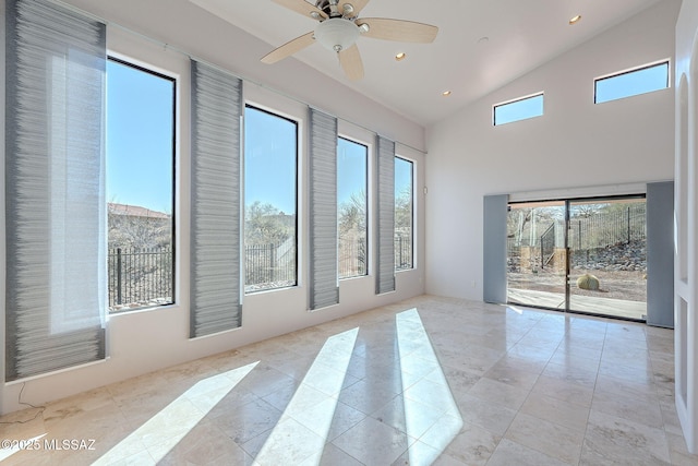 spare room with high vaulted ceiling, recessed lighting, ceiling fan, and light tile patterned floors