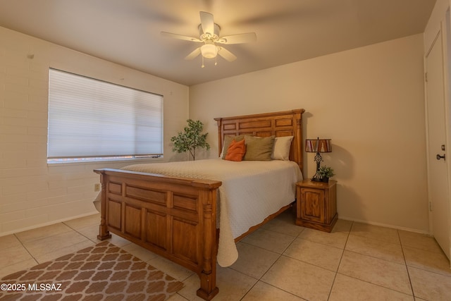 bedroom featuring a ceiling fan and light tile patterned flooring