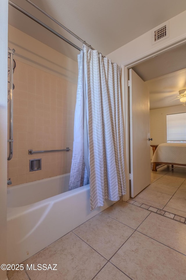 full bath featuring shower / bath combination with curtain, tile patterned flooring, visible vents, and a ceiling fan