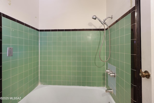 full bathroom featuring tub / shower combination