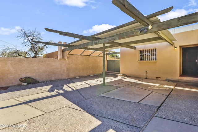 view of patio / terrace with fence