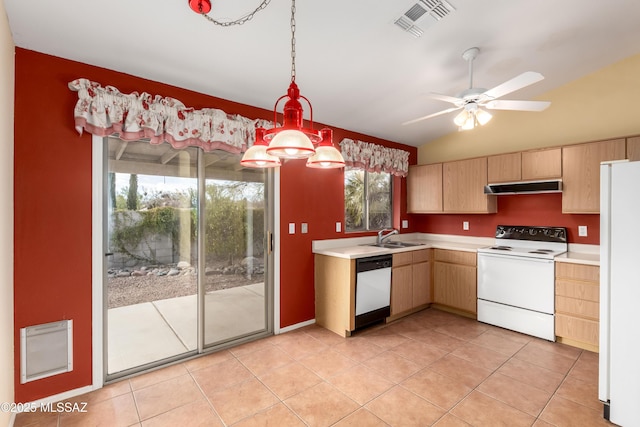 kitchen with light countertops, visible vents, light brown cabinetry, white appliances, and under cabinet range hood