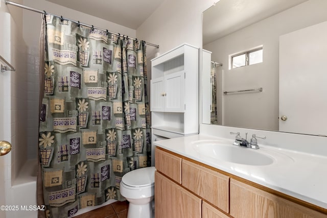 bathroom featuring vanity, toilet, and tile patterned floors