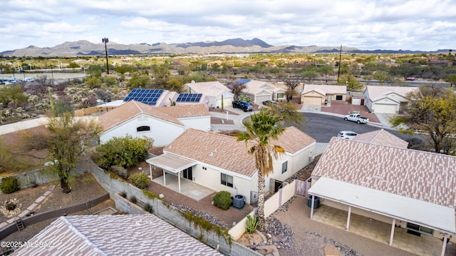 bird's eye view featuring a residential view and a mountain view