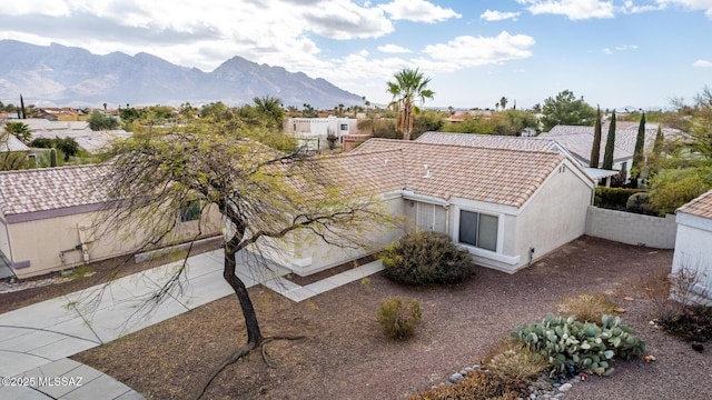 exterior space featuring a mountain view