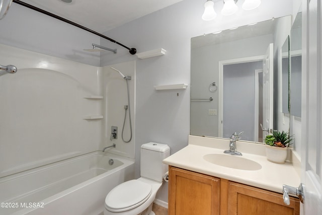 bathroom featuring shower / bath combination, vanity, and toilet