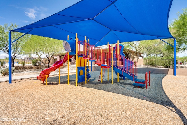 community jungle gym with fence