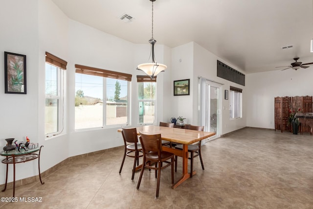 dining area featuring a ceiling fan, visible vents, and baseboards