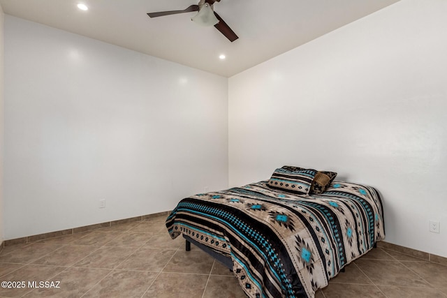 tiled bedroom with recessed lighting, ceiling fan, and baseboards