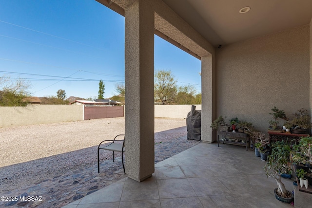 view of patio featuring a fenced backyard