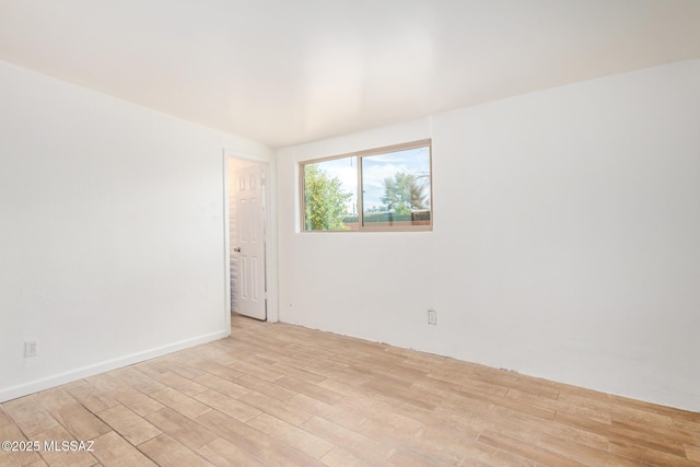 empty room with light wood-style floors