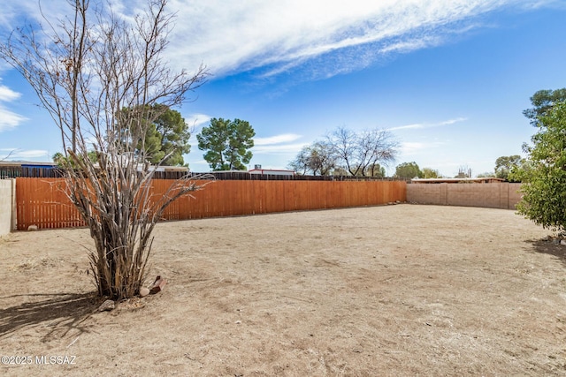 view of yard featuring a fenced backyard