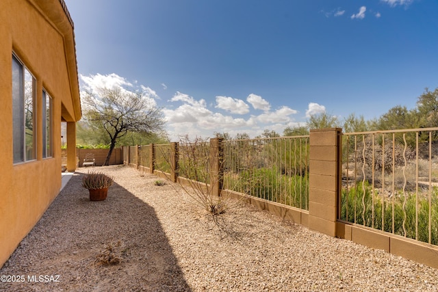 view of yard featuring a fenced backyard and a patio area
